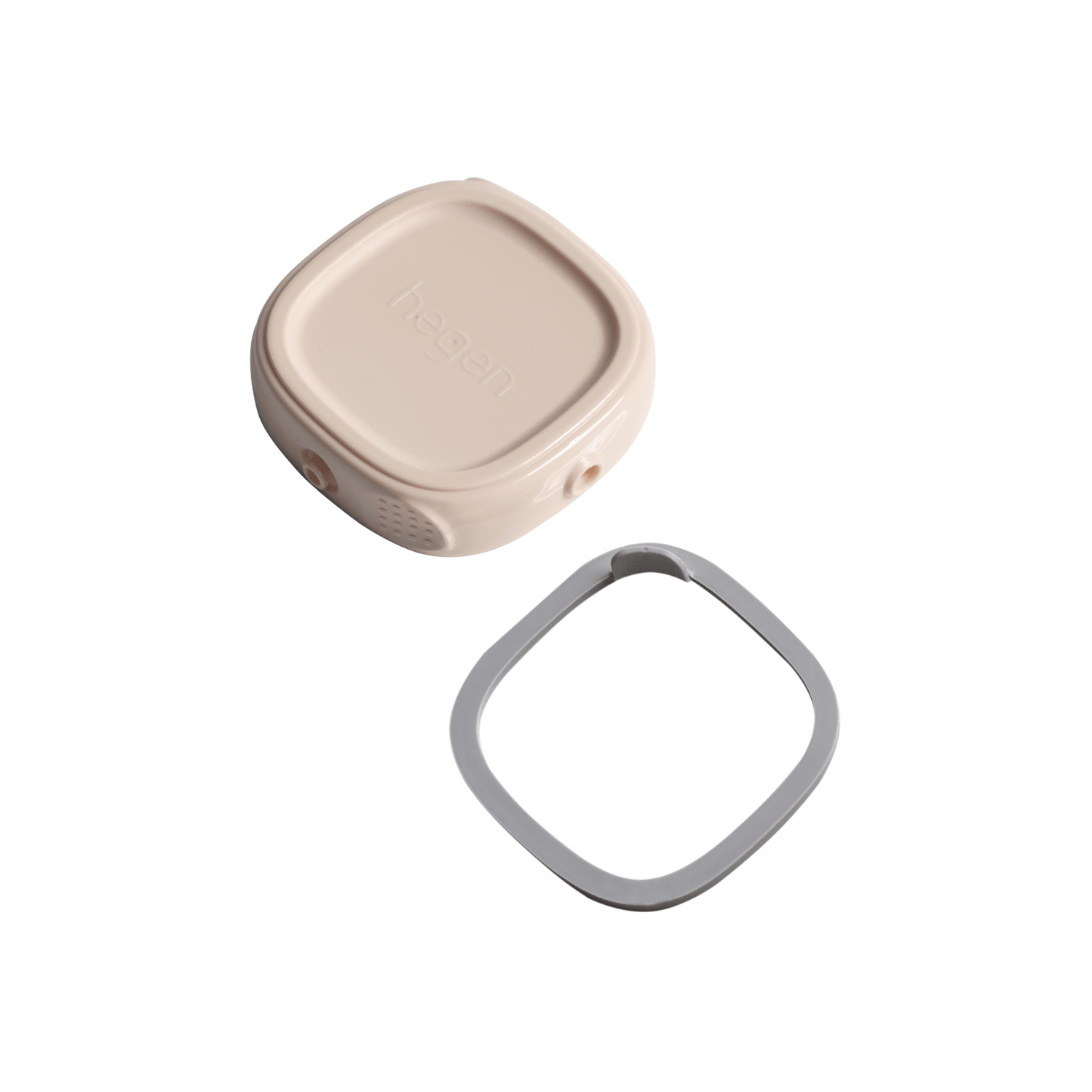 A pink Hegen breast milk storage lid with a snap-on interconnecting button, and a grey lid for storage, stacked on top of each other.