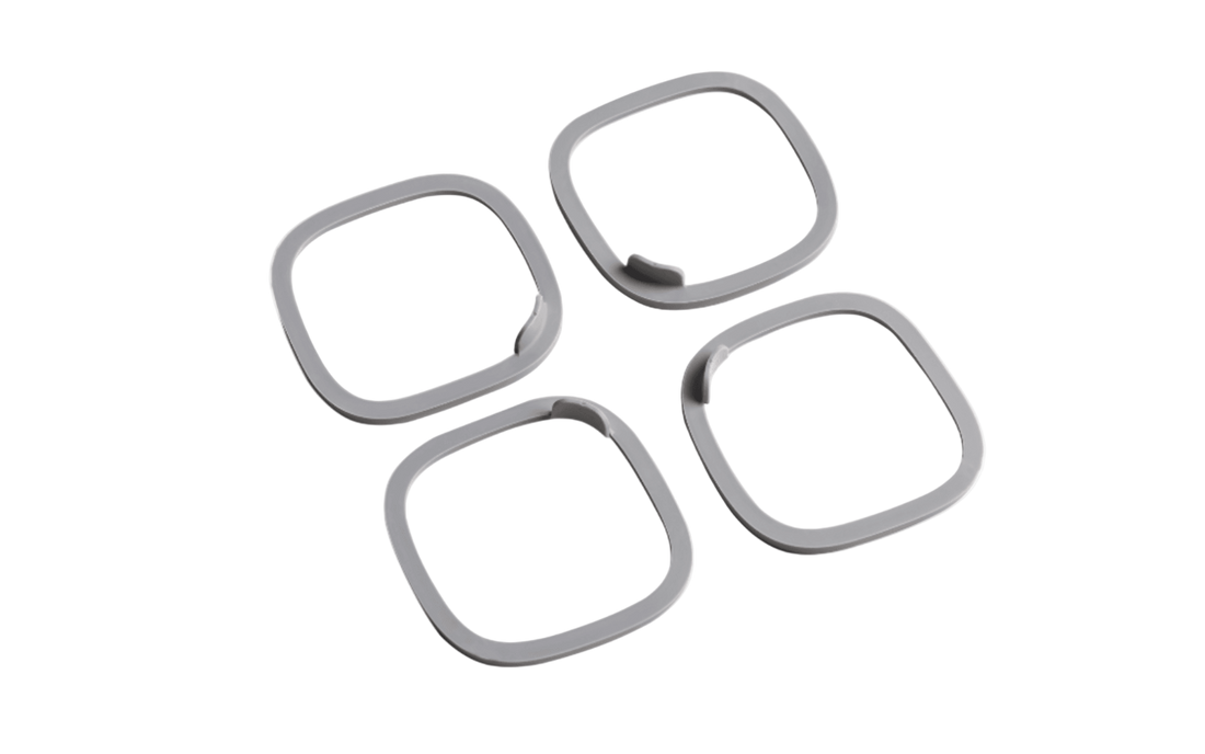 A set of four silicone replacement seals for Hegen breast-pump accessories.