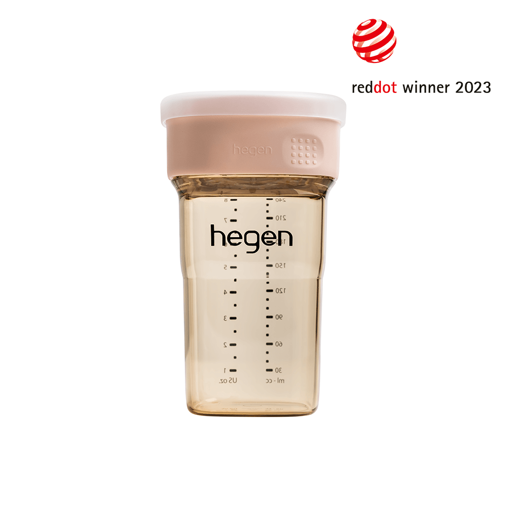 A pink Hegen PCTO 240ml/8oz all-rounder cup with measurement markings, designed for babies.