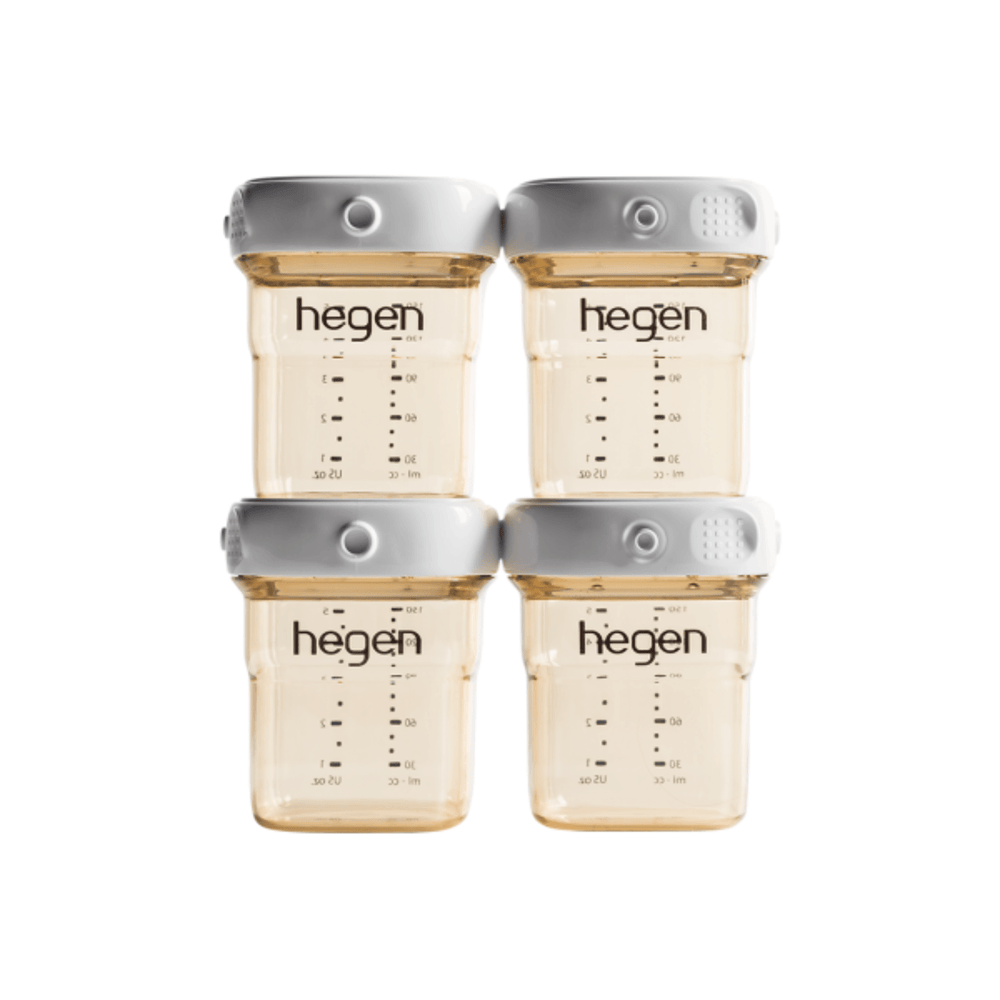 A set of four Hegen PCTO 150ml/5oz breast milk storage containers with measurement markings and white-colored lids.