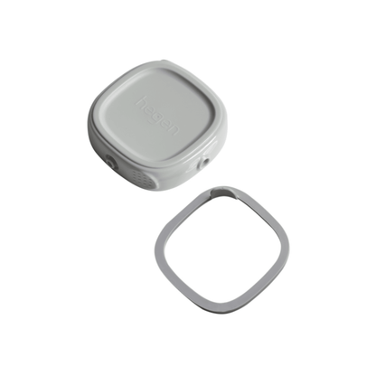 A gray Hegen breast milk storage container lid and its corresponding silicone seal ring.