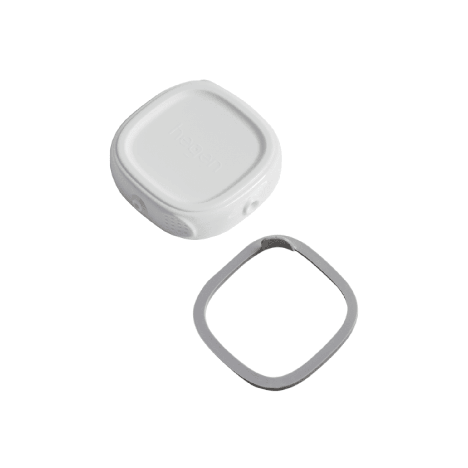 A white Hegen PCTO Breast Milk Storage Lid with its corresponding silicone seal.