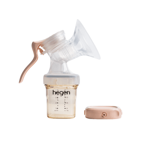 A Hegen manual breast pump kit with a soft silicone shield and a transparent collection container.