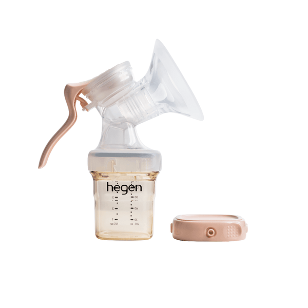 A Hegen manual breast pump kit with a soft silicone shield and a transparent collection container.