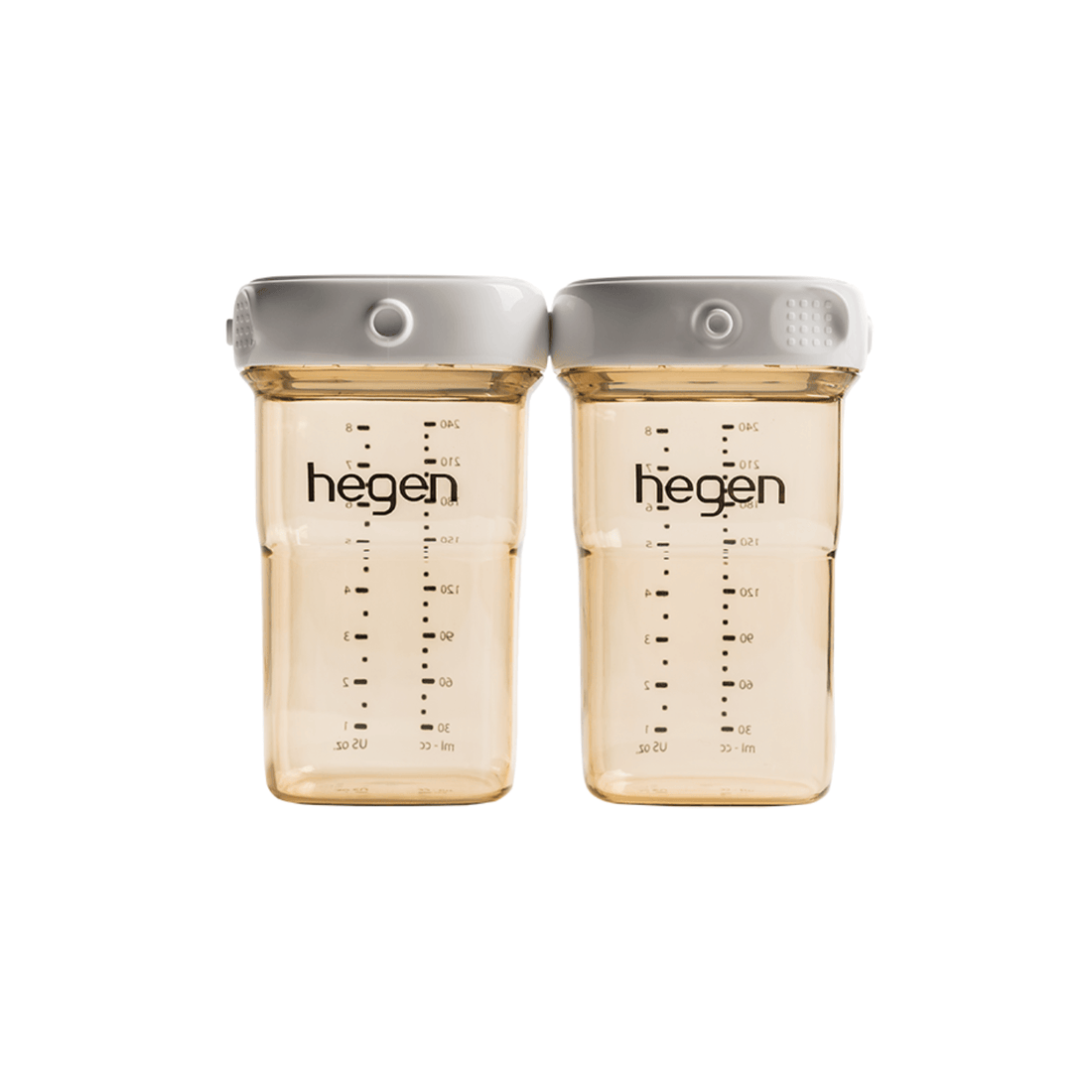 Two transparent Hegen breast milk storage containers with measurement markings and white lids.