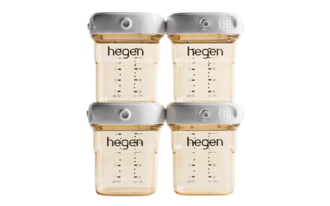 A set of four Hegen PCTO 150ml/5oz breast milk storage containers with measurement markings and white-colored lids.