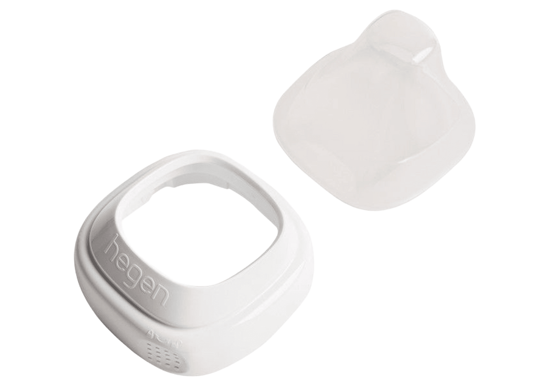 A white Hegen brand baby bottle collar and a transparent cover, designed for converting storage containers into feeding bottles.