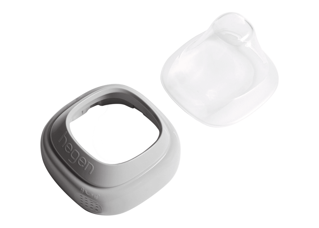 A gray Hegen PCTO collar and a transparent cover designed for converting storage containers into feeding bottles.