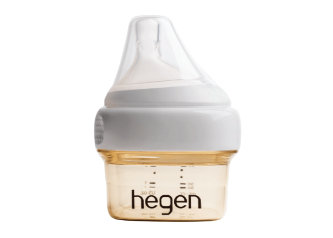 A 60ml/2oz Hegen feeding bottle with an extra slow flow teat, with white collar lid.