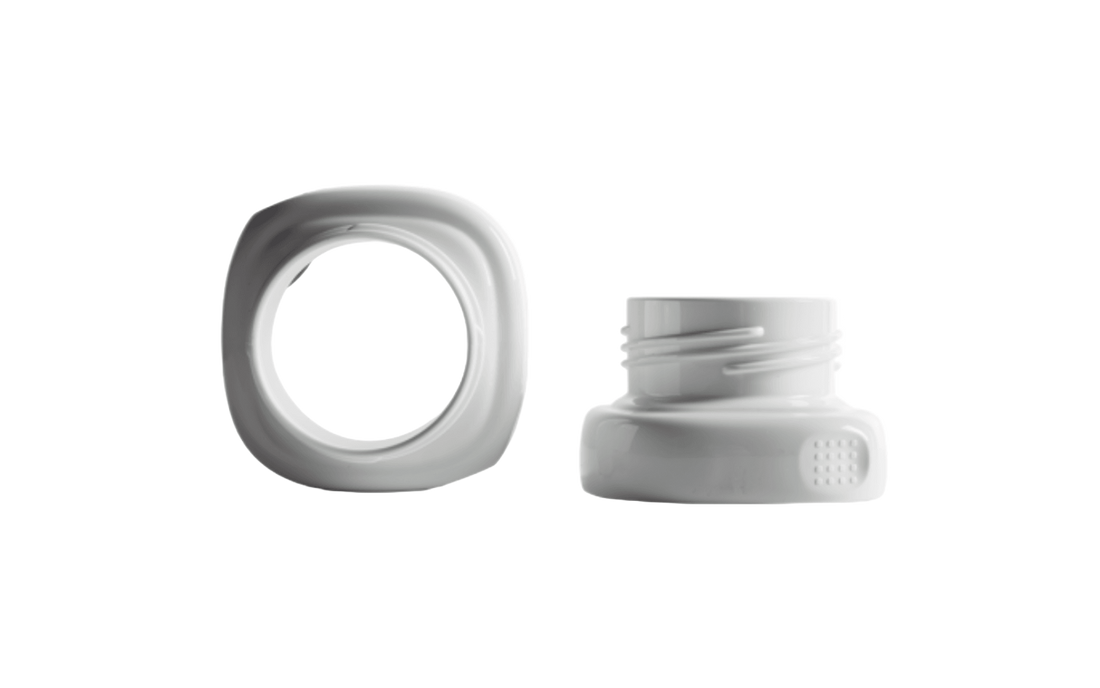 Two white Hegen PCTO Wide Neck Adapters for breast pumps.
