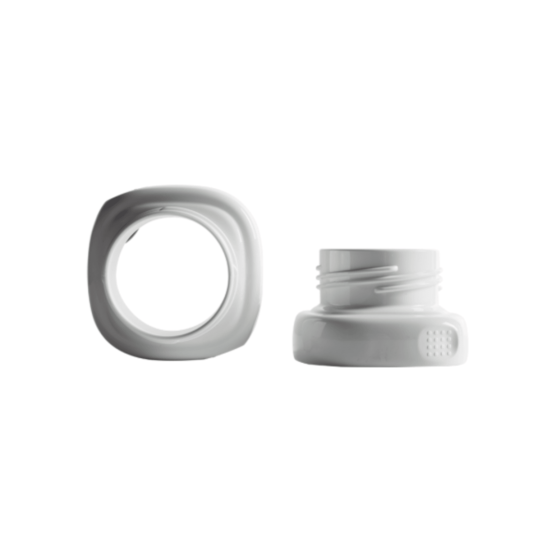 Two white Hegen PCTO Wide Neck Adapters for breast pumps.