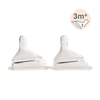 Two transparent silicone teats designed for baby bottles, marked with an indicator for medium flow, suitable for babies 3 to 6 months old.