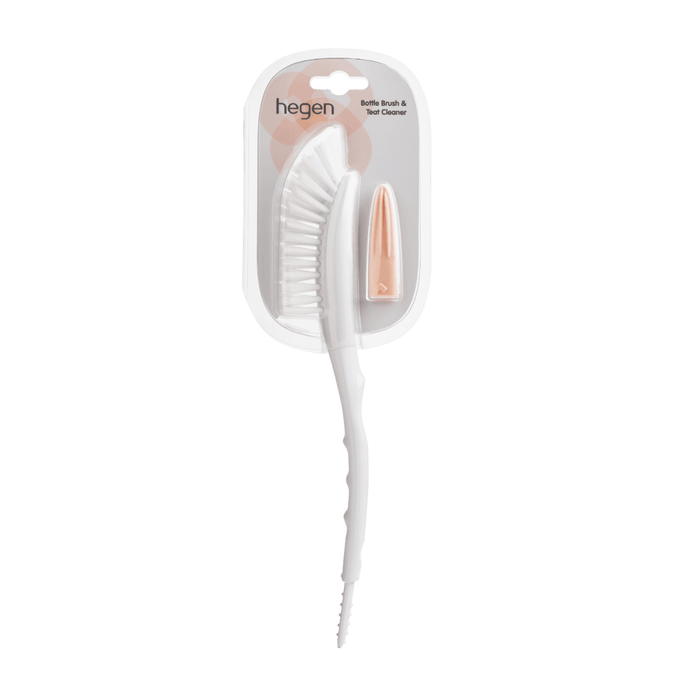A long white bottle brush with soft bristles, and pink silicon tip designed for cleaning bottles and teats.